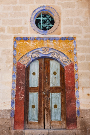 Antique greek colored doors in Mustafapasa village, Cappadocia. Turkey