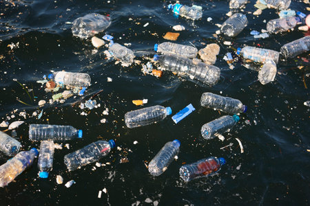 Plastic bottles in the sea. Garbage and pollution. Environmental issues