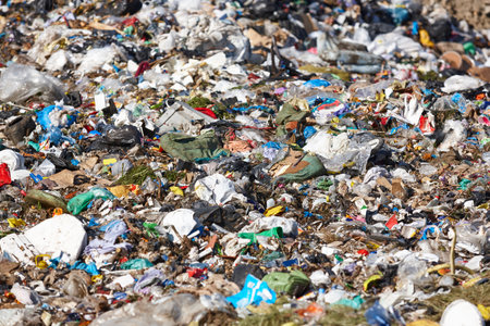 Open air garbage dump. Plastic pollution. Recycling junk. Consumerism