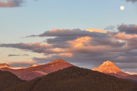 Snowy mountain landscape under the moon. Riano, Castilla Leon. Spainの写真素材