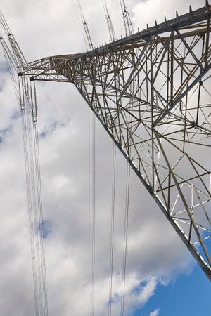 Power line tower. Energy industry. Industrial electricity trasmission. Renewable productionの写真素材