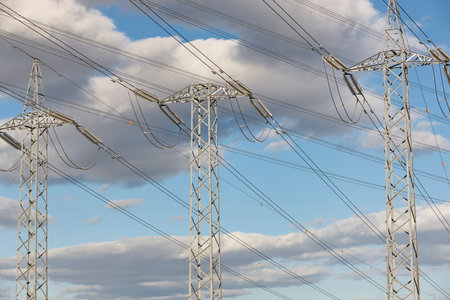 Power line tower. Energy industry. Industrial electricity trasmission. Renewable production