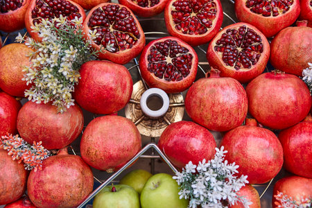 Pomegranates, apples, grapefruits. Fresh fruits on a market placeの写真素材