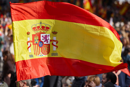 Spanish flag waving. Demonstration in Spain. Spanish emblemの写真素材