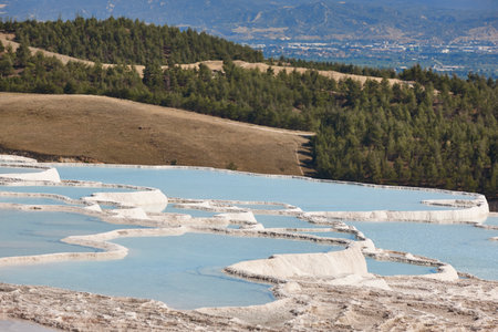 Pamukkale white mineral limestone natural pool. Geology landmark in Turkeyの写真素材