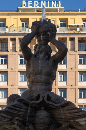 Tritone fountain and Bernini Hotel in Rome city center. Italyの写真素材