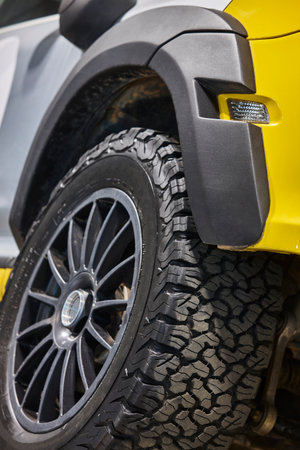 All terrain car tire detail. Off road driving. Transport