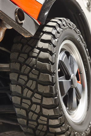 All terrain car tire detail. Off road driving. Transport