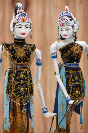 Traditional Indonesian handcrafted female dancers puppets. Asian culture. Indonesiaの写真素材