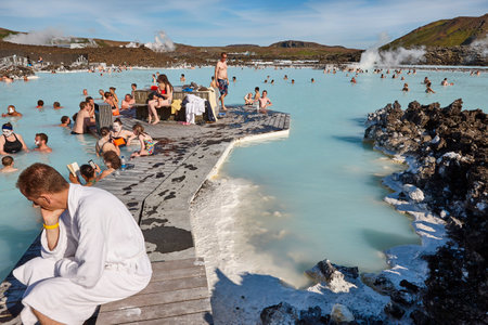 People relaxing at blue lagoon geothermal waters. Iceland attraction landmarkの写真素材