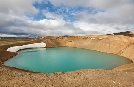 Stora-Viti crater with water inside. Slope with snow. Icelandの写真素材