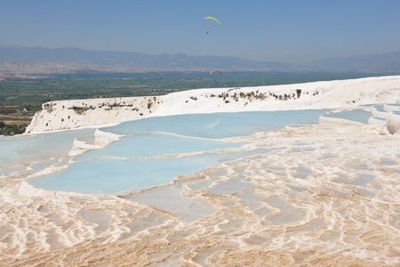 Pamukkale white mineral limestone natural pool. Geology landmark in Turkeyの写真素材