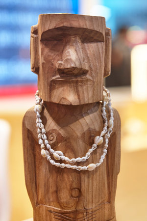 Moai handcrafted wooden statue. Easter island culture. Rapa Nui Chile