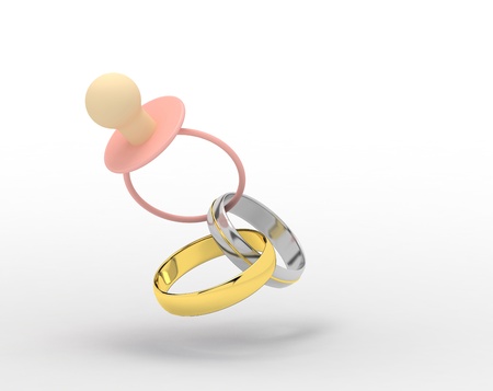 pink pacifier and golden wedding rings connected between each other