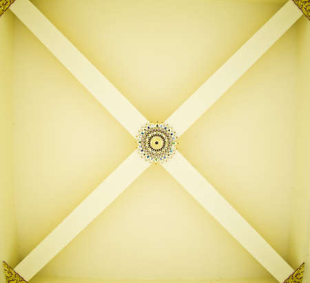 Thai art on temple ceiling の写真素材