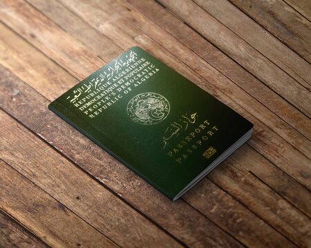 Official passport of Algeria, Algerian passport on the top of a wooden background.の写真素材