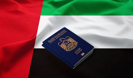 Passports of United Arab Emirates on the top of an flag of emiratesの写真素材