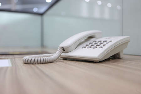 Telephone at the meeting room table, can be used for the landing website page contact pageの写真素材