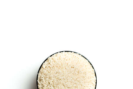 A rice in a bowl isolated over white backgroundの写真素材