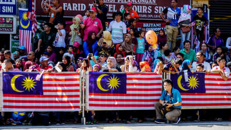 Malaysia flag and the Malaysian peopleのeditorial素材