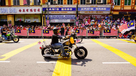 Public peoples watching a convoy of motorcycles club at Malaysia national independance day.のeditorial素材