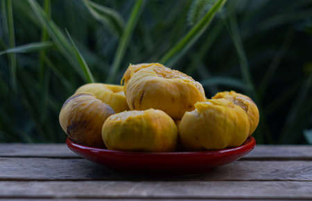 Yellow figs on a plate, well-cooked figs