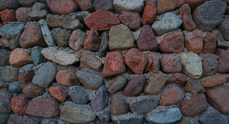 The structure of a stone wall is a wall made of different stones