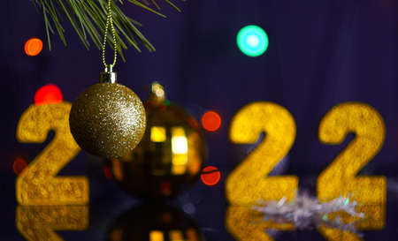 New 2022, not in the spotlight, gold numbers on a blue background