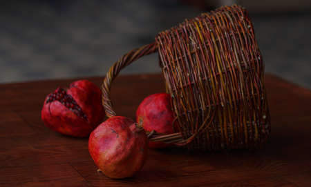 Pomegranates in the basket, big red pomegranatesの写真素材