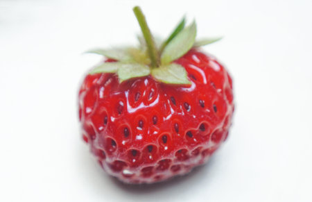 Various strawberries on a white background