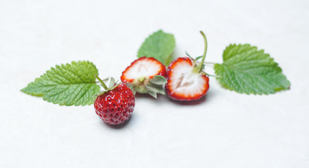 Various strawberries on a white backgroundの写真素材