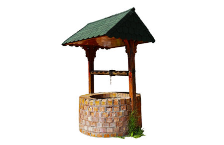 A wooden water well is on a white backgroundの写真素材
