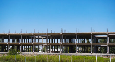 Unfinished concrete construction on the side of the road