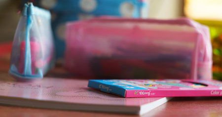 There are various pens on the table in different pens.