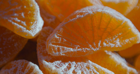Dried tangerine kernels stand in a ball on a board