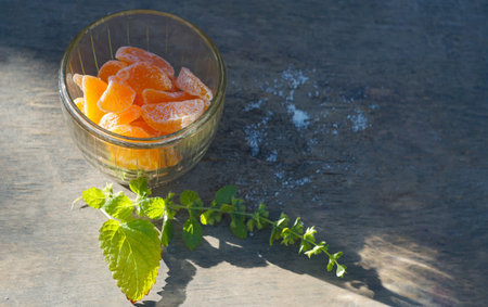There are dried tangerine seeds in a bowl.の写真素材