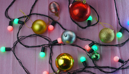 All kinds of Christmas lights and toys are scattered around. Christmas mood.