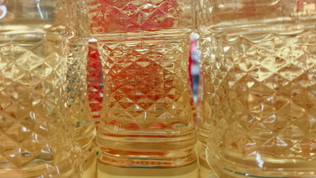 Close-up of a row of crystal glasses in a shop window