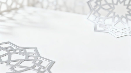 Soft focus background featuring elegant Islamic geometric shadows and mosque-inspired patterns on a bright white surface, creating a calm, luxuriousの写真素材