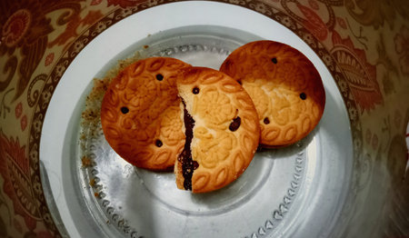 cookies with jam on a white plate in a cafe or restaurant