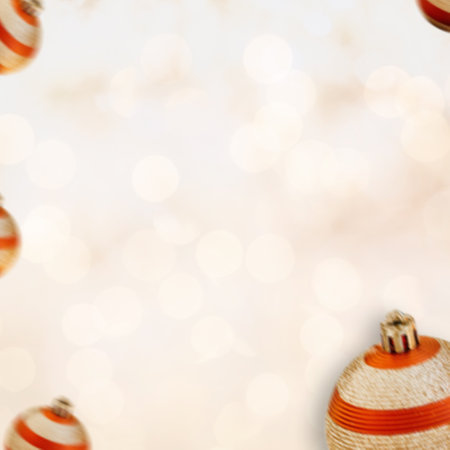 Christmas background with red and white baubles on bokeh lightsの写真素材