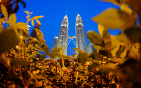 KUALA LUMPUR, MALAYSIA - MAY 25, 2014: Petronas Twin Towers during blue hour sunset. Petronas Twin Towers also known as KLCC (Kuala Lumpur City Centre).のeditorial素材