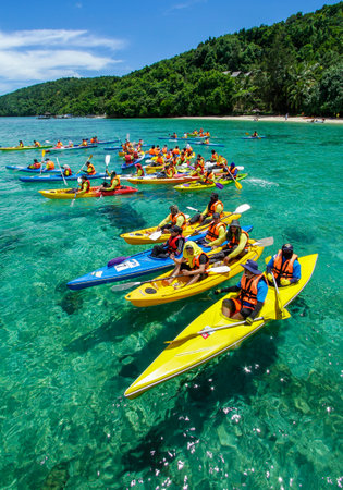 SABAH, MALAYSIA - MAY 16, 2011: People kayaking on the Gaya Island.のeditorial素材