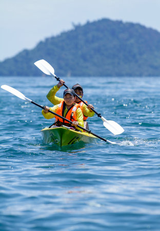SABAH, MALAYSIA - MAY 16, 2011: People kayaking on the Gaya Island.のeditorial素材