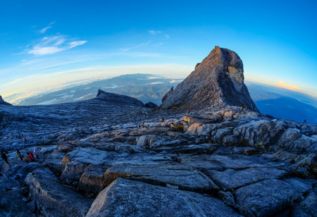 The beauty of St. John Peak (right) and South Peak (left) of Mount Kinabalu, Sabah, Malaysia. Mount Kinabalu or Gunung Kinabalu is the 20th most prominent mountain in the world by topographic prominence.のeditorial素材
