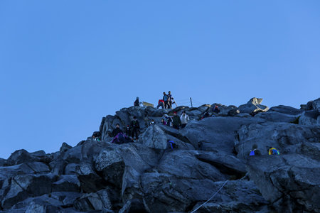 RANAU, MALAYSIA - AUGUST 23, 2014 - Climbers headed to the Low's Peak (4095m) summit of Mount Kinabalu, Sabah, Malaysia. Mount Kinabalu or Gunung Kinabalu is the 20th most prominent mountain in the world by topographic prominence.のeditorial素材