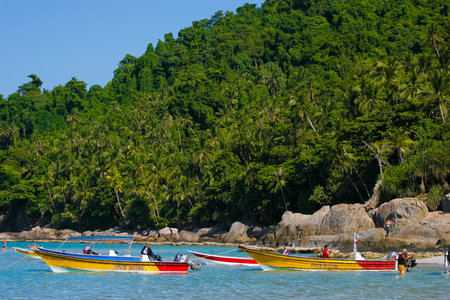 TERENGGANU, MALAYSIA - JUNE 17, 2008 : Boat at Perhentian Island Beach, Terengganu, Malaysia.のeditorial素材