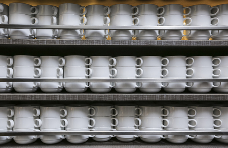 Many rows of white coffee or tea cups.の写真素材