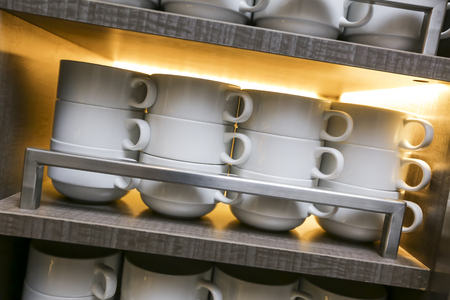Rows of white coffee or tea cups.の写真素材