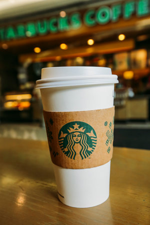 KUALA LUMPUR, MALAYSIA - JULY 04, 2017 : Hot Starbucks coffee in Starbucks Coffee shop. Starbucks Corporation is an American coffee company and coffeehouse chain.のeditorial素材